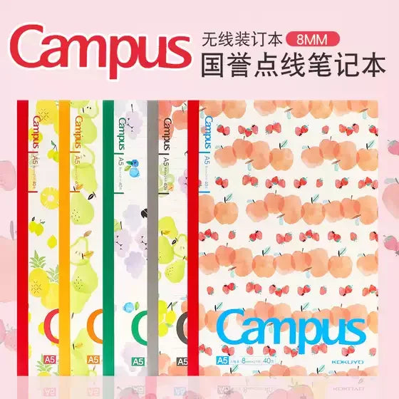 Set of colorful notebooks with 'Campus' branding on a pink background