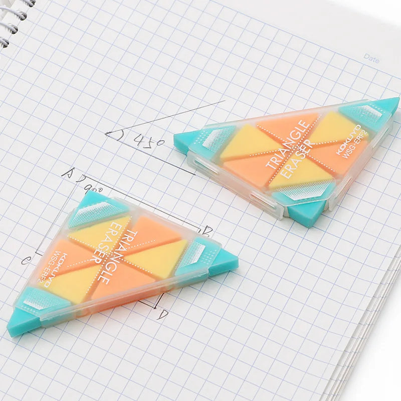 Two triangular erasers on a piece of graph paper