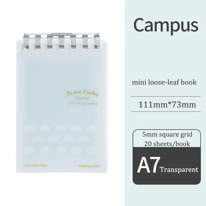 Mini loose-leaf book with transparent cover and grid layout details on a light gray background