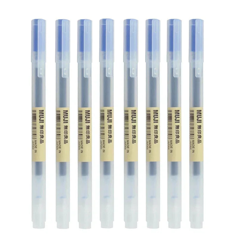 Set of MUJI gel pens on a white background