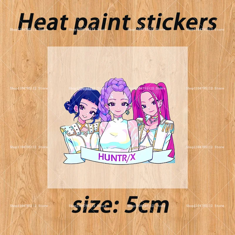 Bentopop heat paint stickers with three Kpop Demon Hunters characters on a wooden background