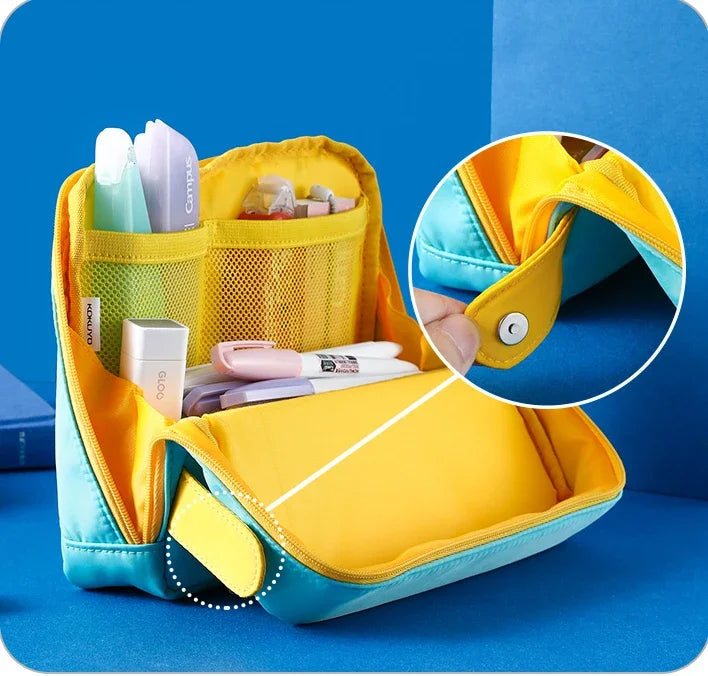 Bentopop yellow and blue stationery bag with products on a blue background