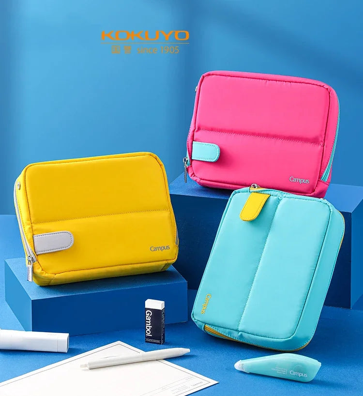 Bentopop three colorful pouches on a blue background with Kokuyo branding.