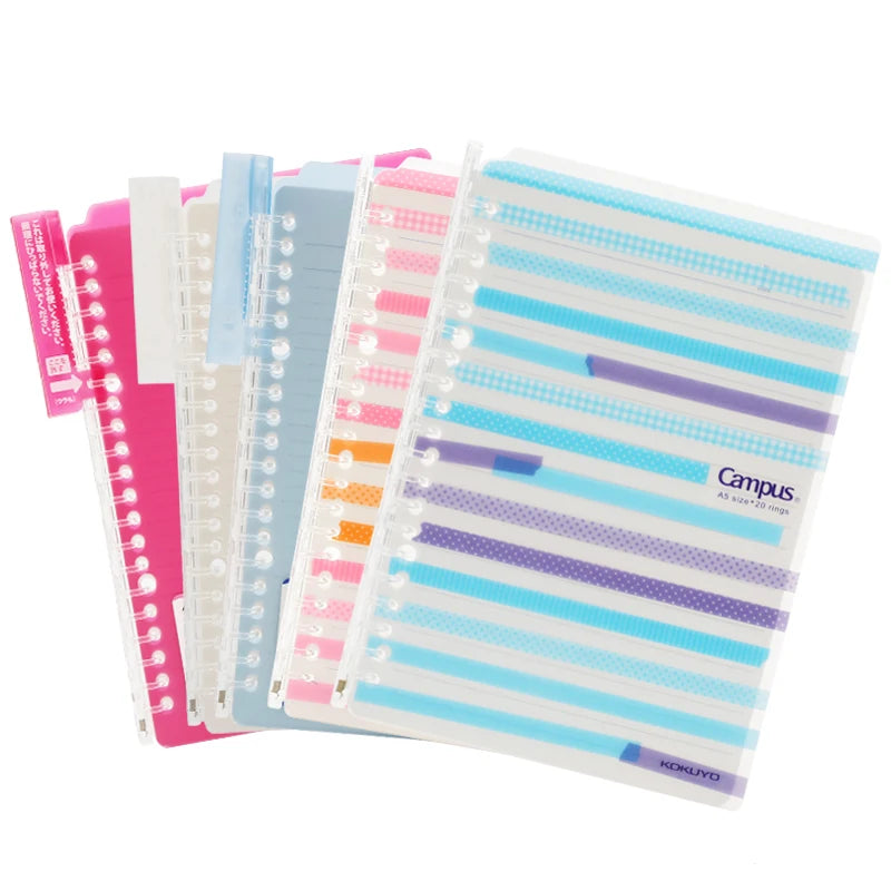 Set of colorful ring-bound notebooks with striped design on a white background