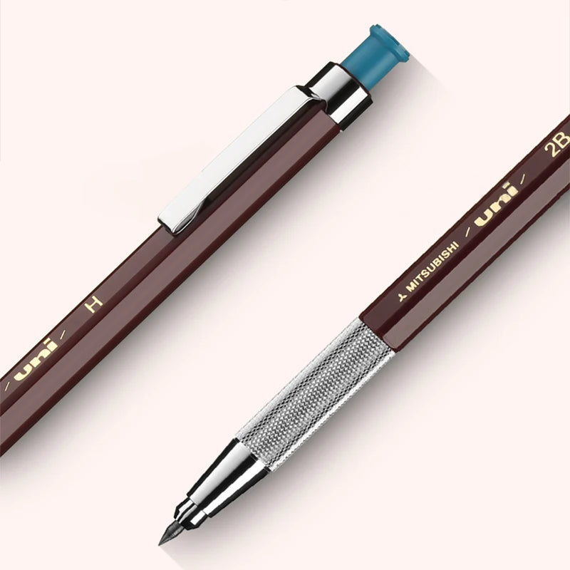 Two mechanical pencils with different lead sizes on a white background
