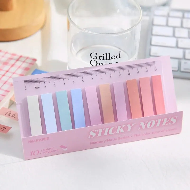 Bentopop set of colorful sticky notes with a ruler on a desk.