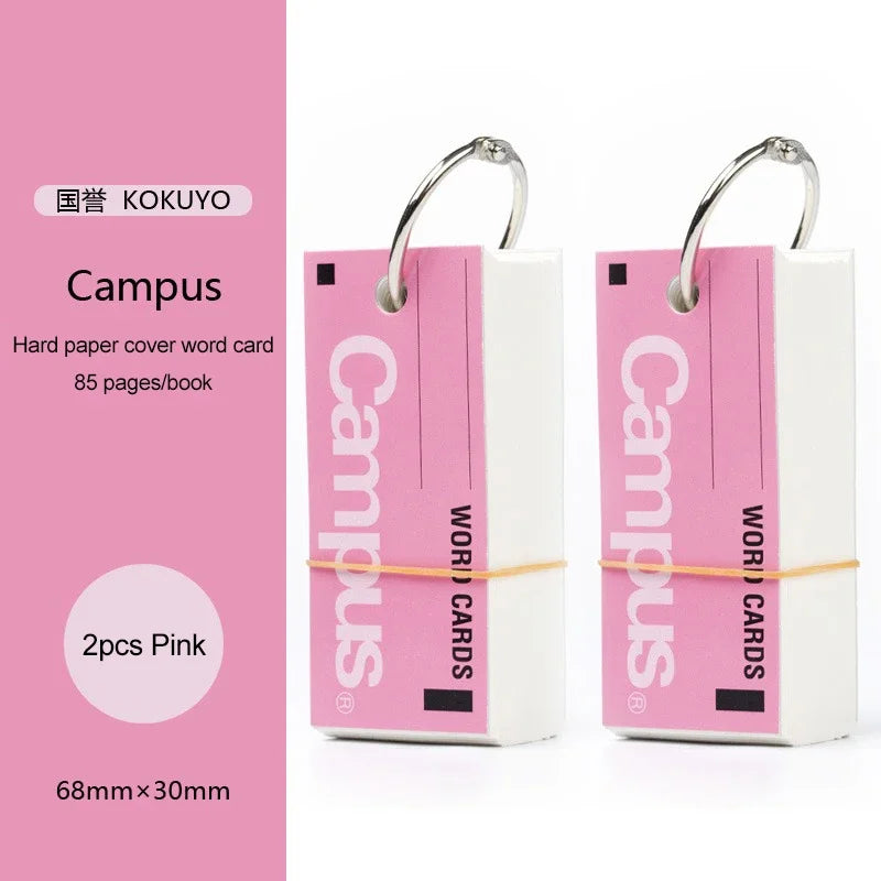 Pink and white 'Campus' word card set with ring on a pink background