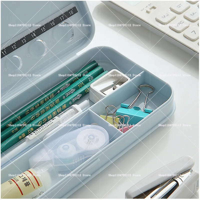 Bentopop pencil case with stationery items including pencils, eraser, and clips on a white background