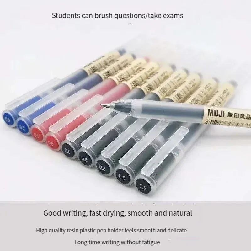 Set of MUJI pens with various ink colors on a white background